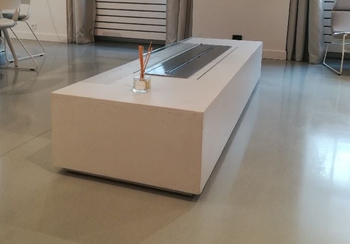 Mikrocement fireplace table feature